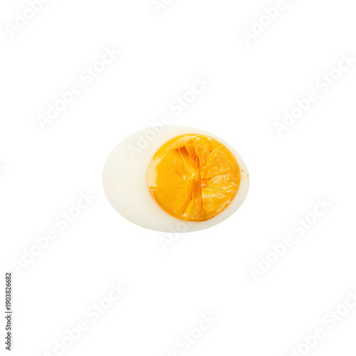 Hard Boiled Egg Cut in Half Showing Yellow Yolk on White Background