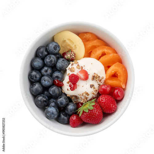 Fresh Fruit Bowl With Blueberries, Strawberries, and Yogurt Served in a White...