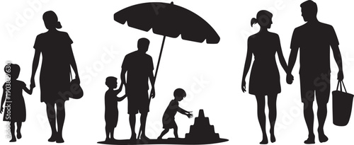 Family silhouettes walking on beach with umbrella