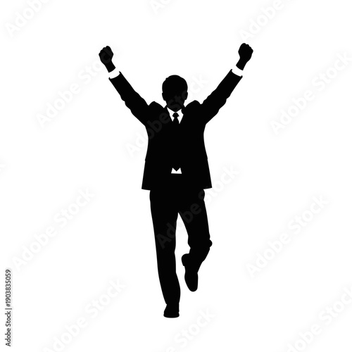 Businessman celebrating success with fists raised in triumph