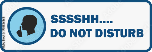 A sign indicating quiet with a silhouette of a person in contemplation, signifying silence and stillness in a serene environment viewed directly.