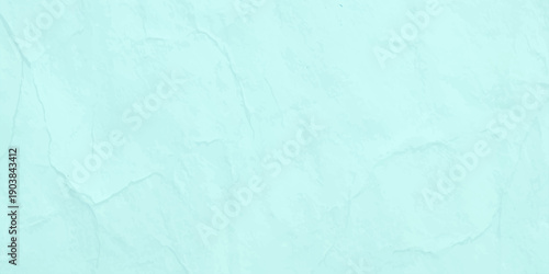 Vintage aged blue paper texture with a grunge rough surface and light green canvas pattern creates a blank weathered art backdrop