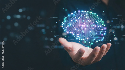 Holographic Projection of a Human Brain Made of Circuit Lines and Nodes Floating Above a Hand