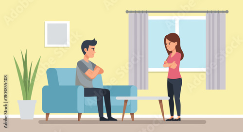 Angry young couple having a relationship conflict while sitting and standing apart in a modern living room, showing frustration and disagreement with crossed arms and upset faces