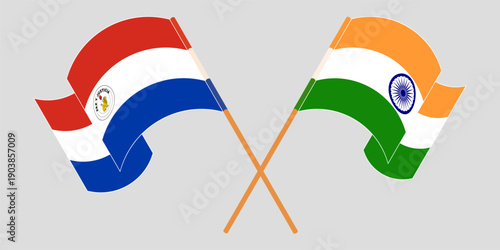 Crossed and waving flags of Republic of Paraguay and India. Vector illustration