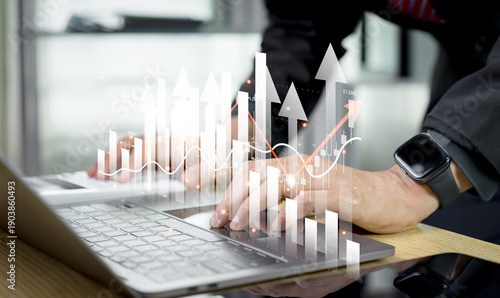 Businessman analyzes a financial growth chart showing rising revenue, market trends, and investment strategies to express economic progress, informed decisions and future business development planning