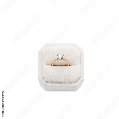 Beautiful Engagement Ring Placed on a Soft Display Box in a Well-Lit Setting