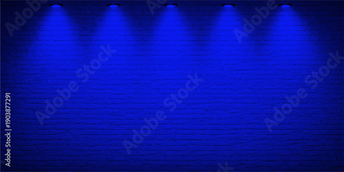 A dark grunge wallpaper design featuring a bright blue stage spotlight shining on a textured wall backdrop with an artistic underwater ocean pattern and black space