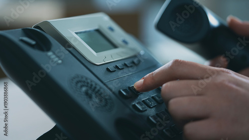 Photos A Businesswoman's Hand Calling On Landline