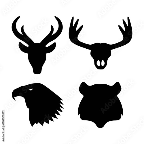 A set of animal silhouettes including deer, elk, eagle, and bear heads in a minimalist flat design style silhouette