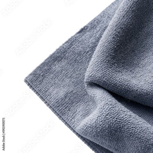 Soft Gray Towel Folded on a Flat Surface in Indoor Setting Showing Texture an...
