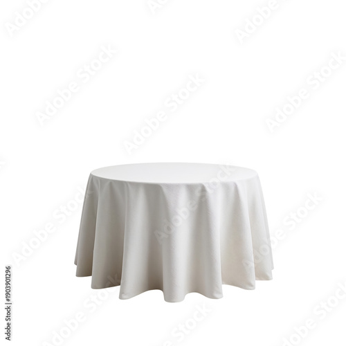 A Table Covered With a White Cloth in a Simple Setting During the Day