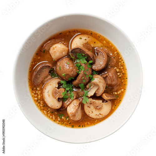 Mushroom Soup With Herbs Served in a White Bowl on a Simple Background