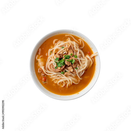 Bowl of Noodle Soup With Herbs and Vegetables Served in a White Bowl on a Pla...