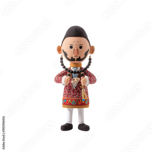Folk Art Doll Holding an Instrument in Traditional Clothing Stands on a Plain...