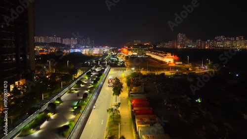Wallpaper Mural Drone Aerial Skyview of a Mega Luxury Cruise Ship is docking at the Kai Tak cruise terminal near Kai Tak Sports Park Kwun Tong Kowloon Victoria Harbour Hong Kong Torontodigital.ca