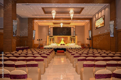 PIMPRI, INDIA - FEBRUARY 11, 2026: Interior view of a decorated banquet hall during a wedding setup 