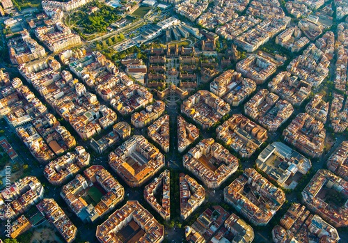 Cuadro en lienzo Clean aerial sunrise view of Barcelona highlighting the Eixample grid pattern and dense residential architecture