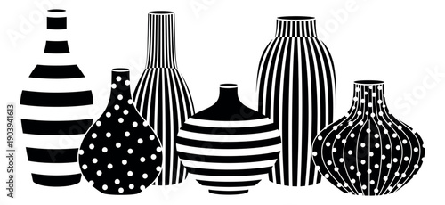 Modern decorative vase set featuring black and white striped and polka dot patterns for home decor