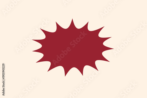 Abstract red starburst shape on beige background