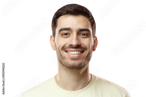 Close up shot of young smiling man isolated on pink background