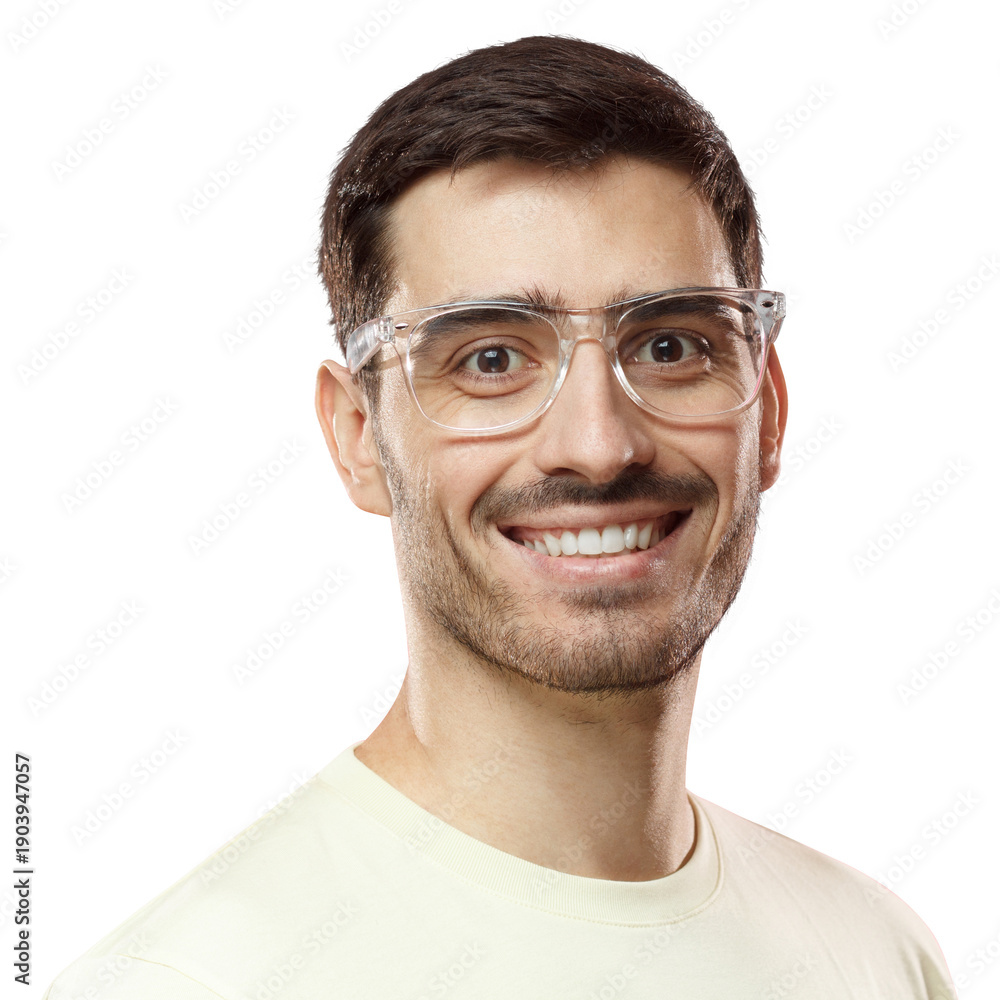 Obraz premium Indoor headshot of young handsome Caucasian male isolated on pink background dressed in casual T-shirt, wearing trendy plastic glasses, looking at camera with calm face expression and happy smile
