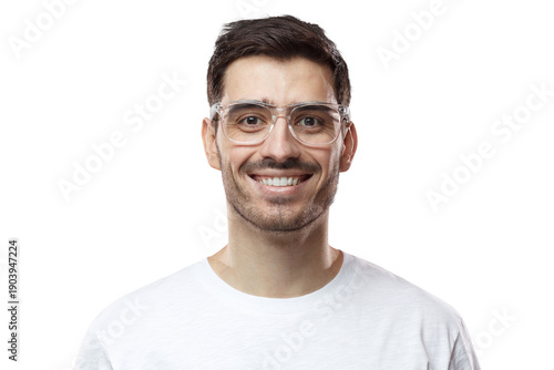Close up shot of smiling attractive man in white t-shirt and trendy trasparent eyeglasses isolated on pink background