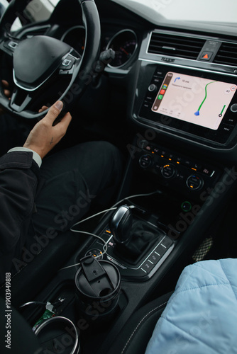 Anonymous driver in the car with navigator 