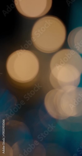 Abstract background with lens bokeh effect for title or logo display. Colourful light leaks on blurred background with copy space. Template for vertical design.
