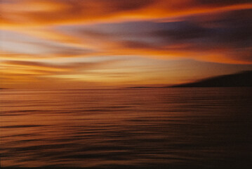 Blurry abstract photo of the beach at sunset