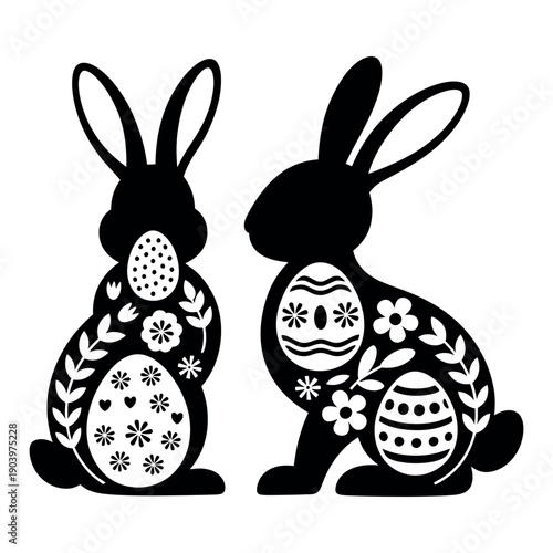 Two Easter bunnies with decorated eggs and flowers