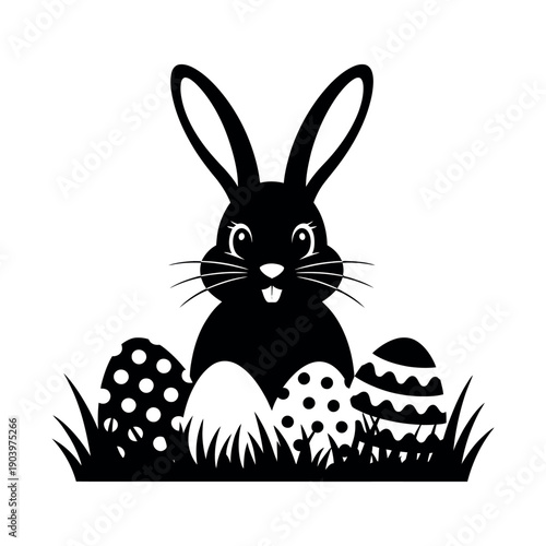 A black silhouette of a bunny with Easter eggs