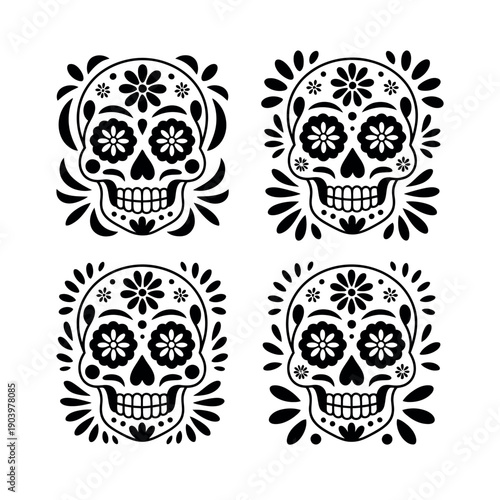 A set of four black and white sugar skulls with floral designs on a white background