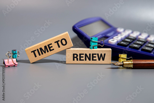 Принти на полотні Time to renew message written on ripped torn red paper on green background