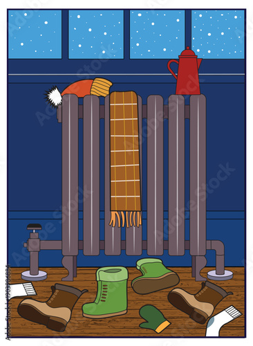 An old-fashion room radiator heats winter gear.
