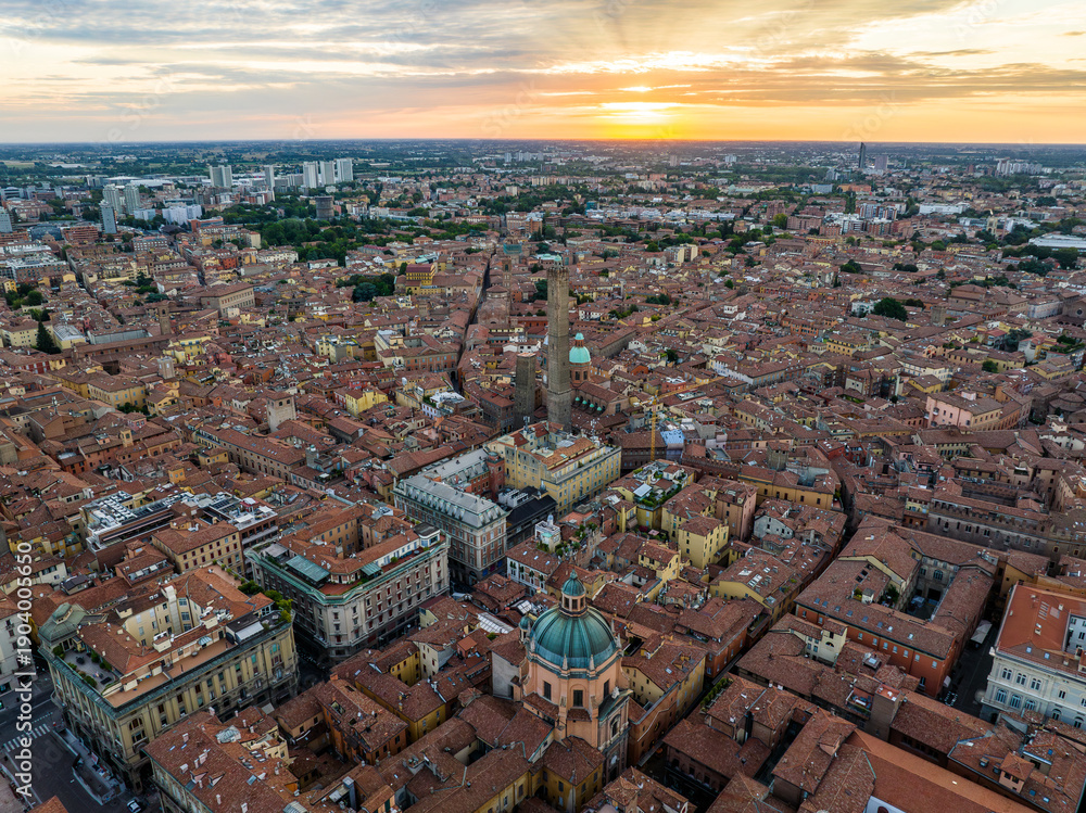 Obraz premium Aerial view of Bologna city skyline at sunset with Asinelli Tower, Italy
