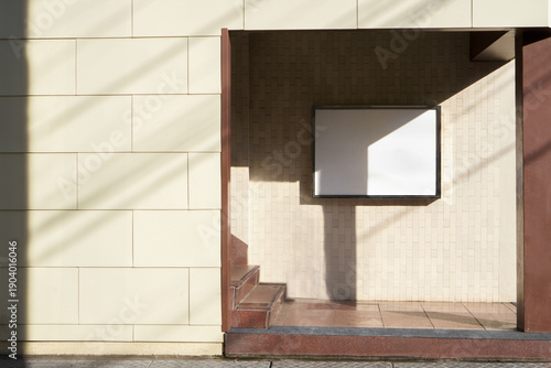 Wallpaper Mural Bright Yellow Wall with a Blank White Poster on a Sunny Day Torontodigital.ca