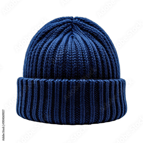 Navy blue knitted beanie on black backdrop, showing ribbed texture and folded brim