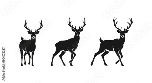 Three Deer Silhouettes Standing and Walking.