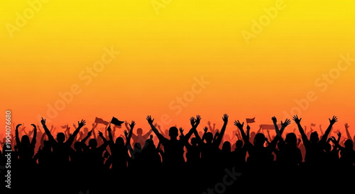 Silhouetted crowd cheering with hands raised against vibrant orange sunset background at outdoor music festival