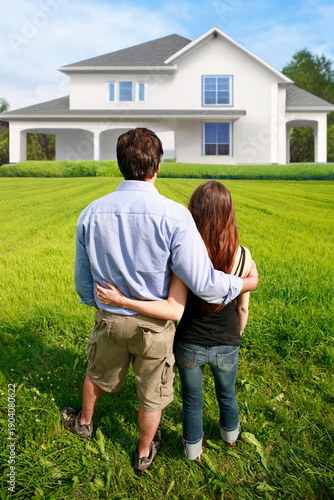 Bilde på lerret Rear view of young couple hugging dreaming of their new home.