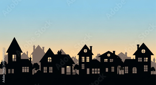 Silhouette of houses in a neighborhood at sunset.