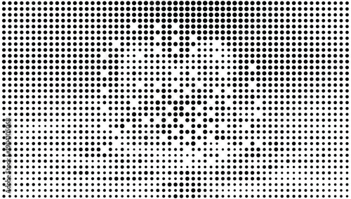 Optical illusion featuring a dense pattern of plus and cross symbols in black and white