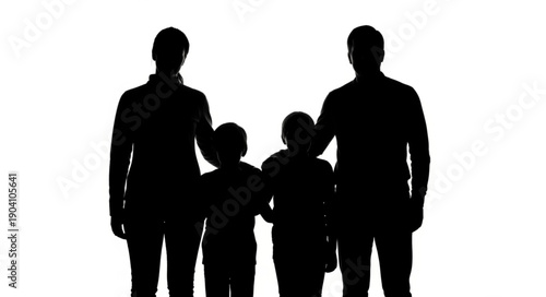Silhouette of a loving family with two children standing together.