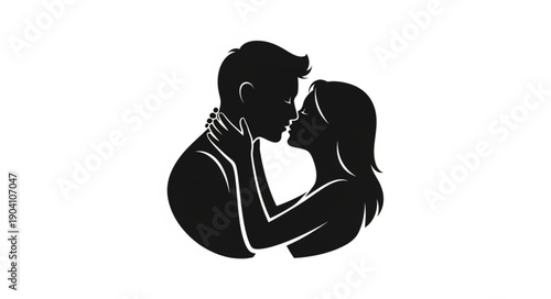Silhouette of a couple embracing and about to kiss.