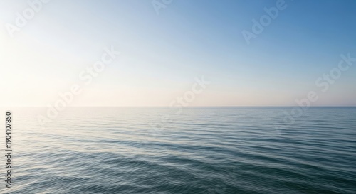 Serene ocean water with gentle ripples reflecting blue sky and soothing light for calming atmosphere and peaceful relaxation experience always.