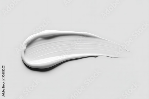 Abstract white cream smear texture on gray background