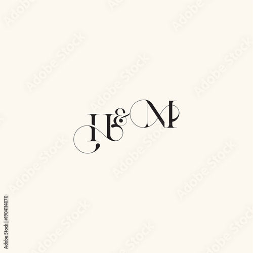 with monogram concept elegancy and beauty in one look MH wedding caligraphic logo letter
