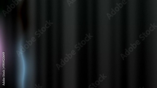 Abstract image featuring soft, flowing lines and gradients in dark tones
