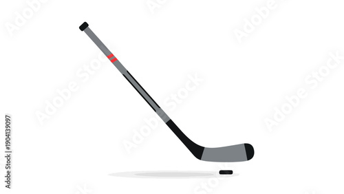 Hockey stick and puck on ice